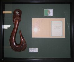 Maori hook carving with document