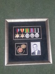 Medals, dog tag and photo